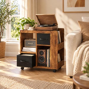 May include: A wooden record player stand with a rustic brown finish, featuring a top-loading turntable, two black drawers with handles, open shelving for vinyl records, a Marshall speaker, and books, all mounted on four small black caster wheels.