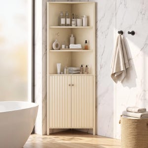 May include: A tall, cream-colored corner cabinet featuring three open shelves at the top and a lower storage section with two doors. The cabinet doors have a vertical fluted texture and small round knobs. The shelves hold various bathroom items.