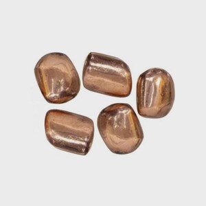 May include: Five polished, tumbled stones with a metallic copper-toned finish. Each stone features a smooth, rounded, and irregular shape with a reflective surface that catches light, displaying warm bronze and reddish-brown hues throughout.