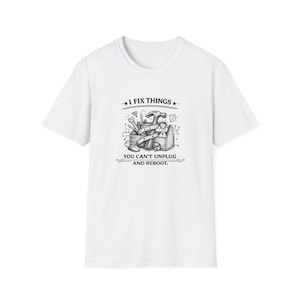May include: White t-shirt with a graphic design featuring tools in a toolbox, a hammer, and the text "I FIX THINGS. YOU CAN'T UNPLUG AND REBOOT."