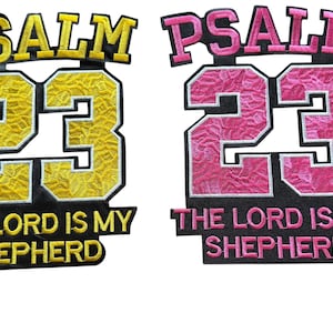 May include: Two embroidered patches featuring the word PSALM at the top, the number 23 in the center, and the text THE LORD IS MY SHEPHERD at the bottom. One patch has yellow embroidery on a black background, and the other has pink embroidery on black.