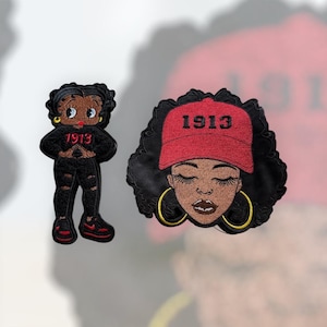 May include: Two embroidered patches featuring Black women. One depicts a woman in a red cap with "1913" and gold hoop earrings. The other shows a woman in a black outfit with "1913" on her top and red shoes.