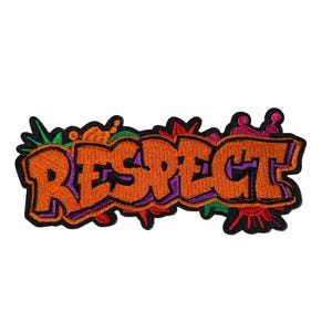 May include: Embroidered patch with the word "RESPECT" in orange graffiti-style lettering. The patch has a black border with accents of purple, green, and red. The patch is likely for clothing or accessories.