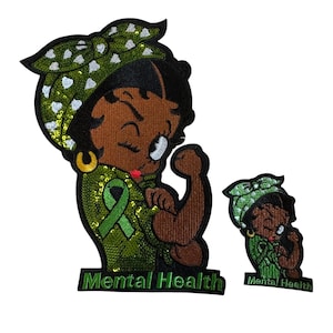 May include: Two embroidered patches featuring a cartoon woman with a green ribbon and headscarf. The larger patch shows the woman flexing her arm, with the words "Mental Health" below. The smaller patch is a miniature version of the larger one.