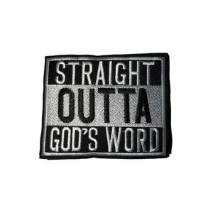 May include: A black and white embroidered patch with the text "STRAIGHT OUTTA GOD'S WORD". The patch has a rectangular shape with a black border and a gray and white center. The text is in a bold, blocky font.