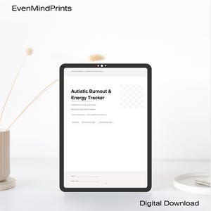 Peut inclure: Une tablette noire affiche un planificateur numérique intitulé "Autistic Burnout & Energy Tracker". Le texte comprend "Comprenez votre énergie, évitez l'épuisement professionnel et planifiez vos journées sans vous sentir dépassé". Le texte "Digital Download" est en bas.