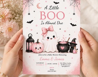 May include: A baby shower invitation card featuring a cute ghost with a pink bow, a pink pumpkin, a black lantern, a cauldron, and a black cat wearing a witch hat. The text reads A Little BOO Is Almost Due, Emma & James, and event details.