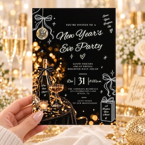 May include: A black New Year's Eve party invitation card featuring white line art of a disco ball, ribbons, and a gift box. The text reads: You're invited to a New Year's Eve Party, Dec 31, 8:00 p.m., The Anderson Residence, 123 Celebration Lane, Austin, TX.