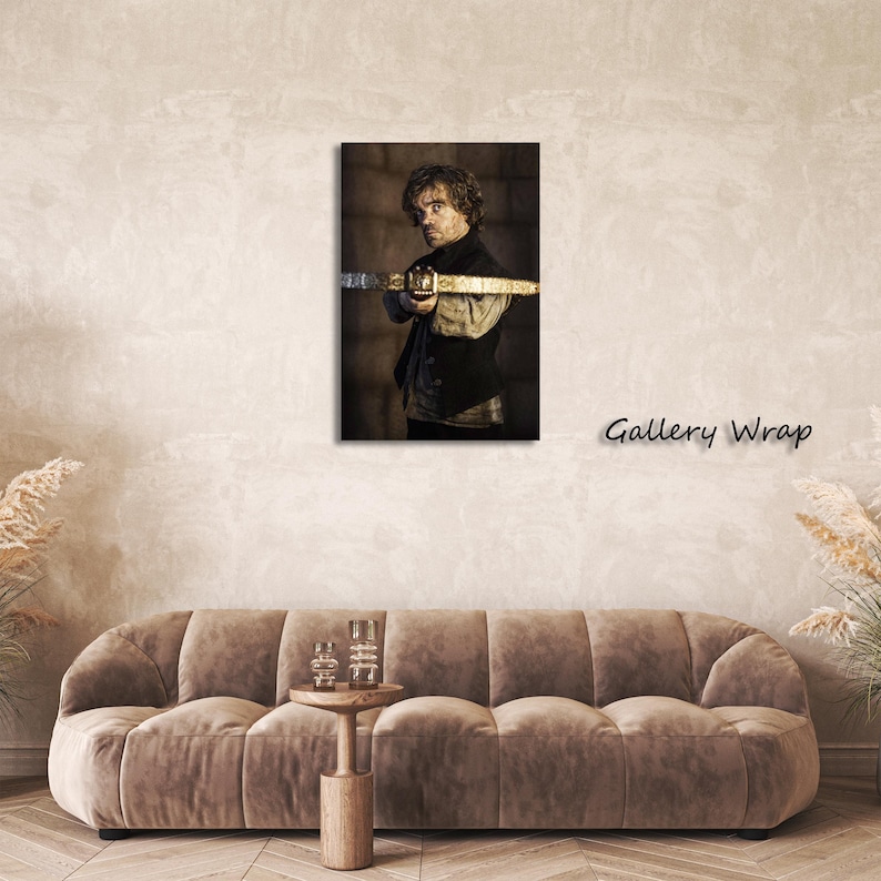 May include: A framed canvas print featuring a portrait of a man holding a crossbow. The image has a sepia tone, with the text "Gallery Wrap" in the lower right corner. The man is wearing a dark vest and shirt.