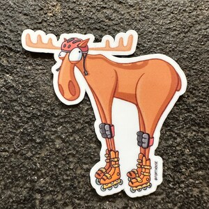 May include: A cartoon moose wearing a red helmet and roller skates. The moose is brown and has large, expressive eyes. The roller skates are orange and have black wheels. The sticker has the text "#FORTHOUSEOF" on the bottom right corner.