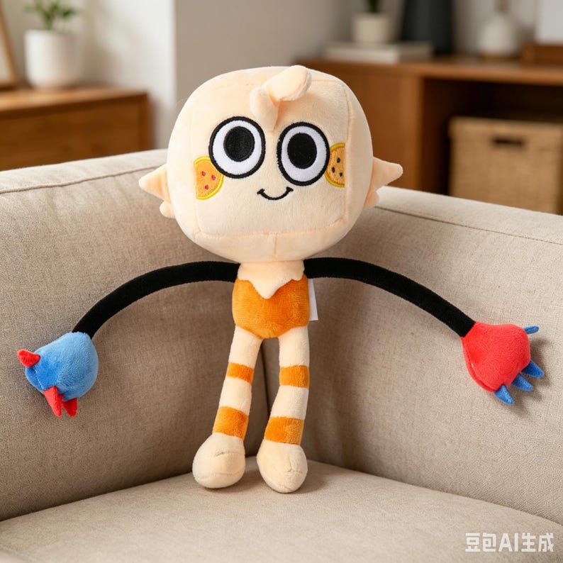 May include: A plush doll with a round, light-yellow head, large black eyes, and a smiling mouth. It has orange and white striped legs, black arms, and blue and red hand-like appendages. The doll is sitting on a beige couch.