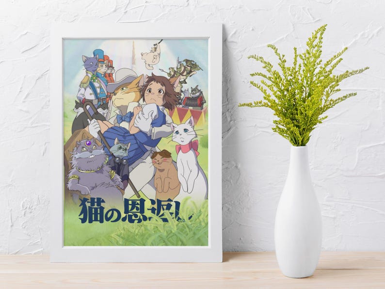 May include: A framed print featuring a colorful anime illustration with various anthropomorphic cats. The artwork showcases a group of cats in different outfits and poses, with Japanese text at the bottom. The frame is white, and the print is displayed on a white wall.