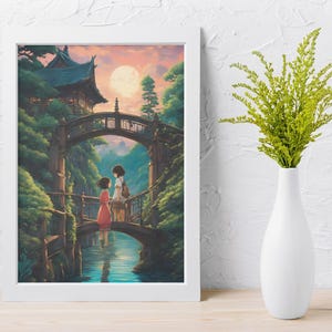 May include: A framed vertical wall art print featuring an illustration of two figures standing on a stone bridge over a river, with a traditional building, lush green trees, and a large full moon in the background, displayed next to a white vase.