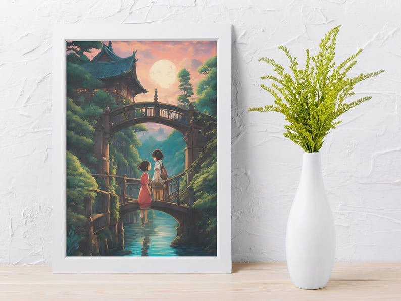 May include: A framed vertical wall art print featuring an illustration of two figures standing on a stone bridge over a river, with a traditional building, lush green trees, and a large full moon in the background, displayed next to a white vase.