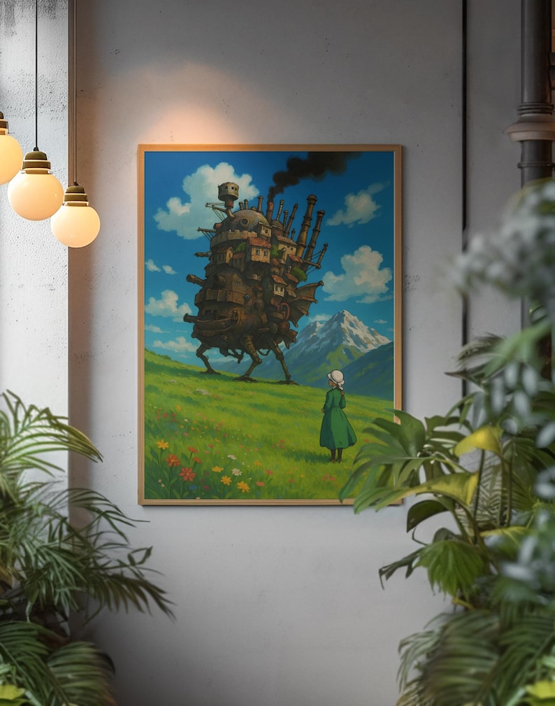 May include: A framed art print depicting a scene from a fantasy film. The artwork features a walking castle with smoke billowing from its chimneys, a girl in a green dress, and a mountain range under a blue sky.