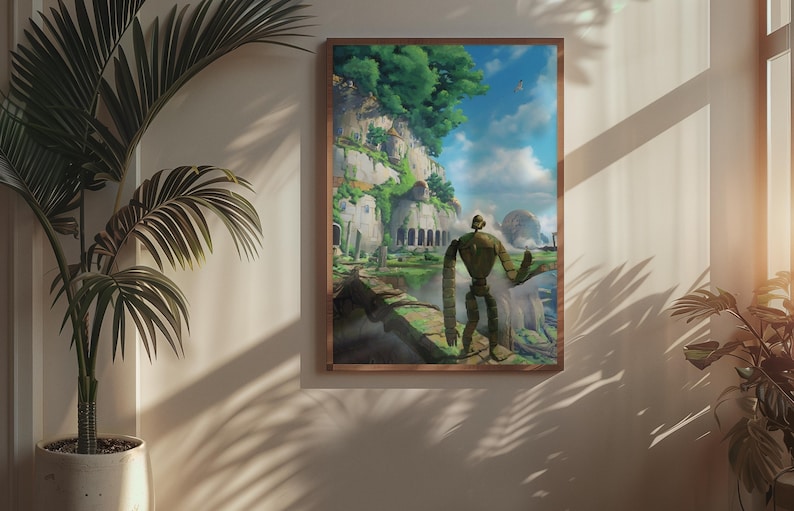 Puede incluir: Una impresi&oacute;n art&iacute;stica enmarcada representa un paisaje fant&aacute;stico con una figura de robot imponente. La obra de arte presenta una paleta de colores vibrantes, mostrando un exuberante acantilado verde, un cielo azul brillante y una serena masa de agua. La impresi&oacute;n se exhibe en una pared junto a una planta en maceta.