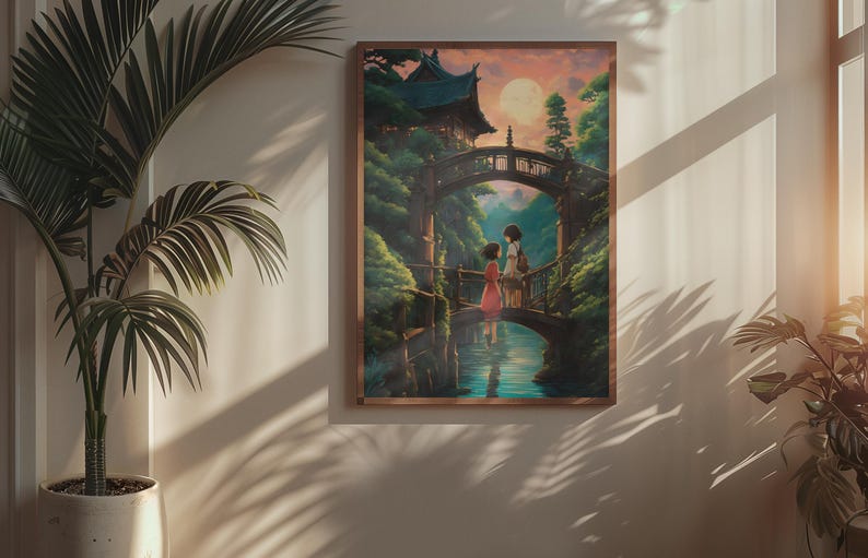 May include: A framed wall art print featuring an illustration of two figures standing on a stone bridge over a calm stream. The scene includes lush green trees, a traditional building, and a large full moon in a soft, warm-toned evening sky.