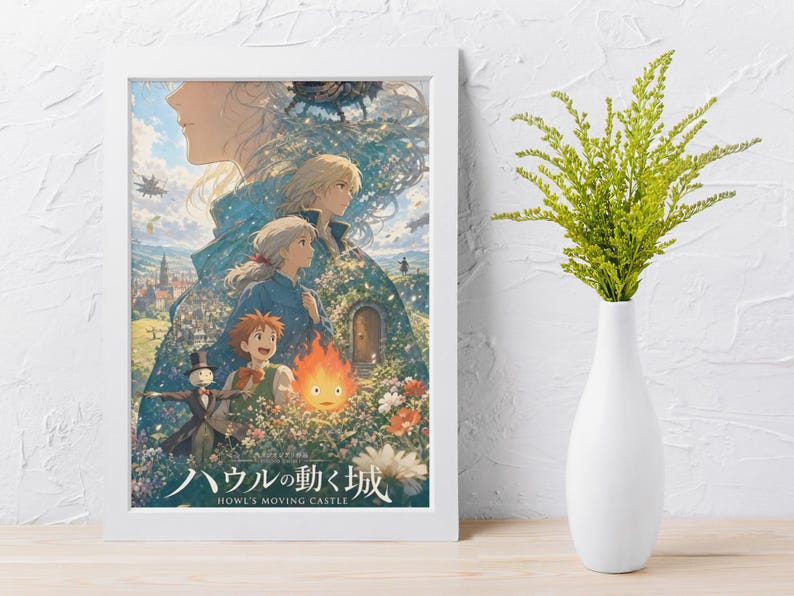 May include: A framed poster featuring an anime illustration of characters from Howl's Moving Castle, including a fire spirit, a scarecrow, and a landscape background, with the Japanese title and English text Howl's Moving Castle at the bottom.