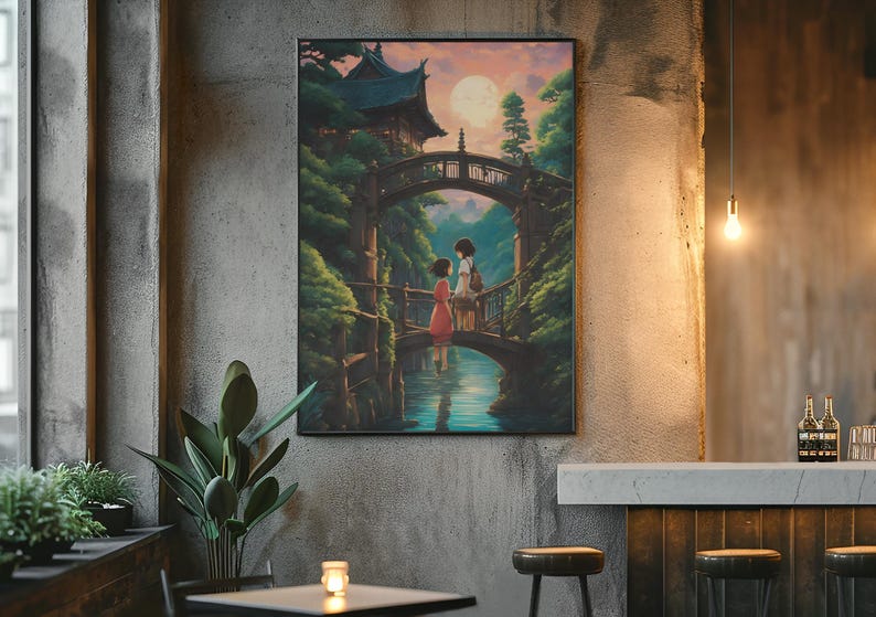 May include: A rectangular wall art print featuring an illustration of two figures standing on a wooden bridge over a river. The scene includes a traditional building, lush green trees, and a large full moon in a soft pink and orange sunset sky.