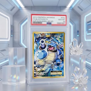 Peut inclure: Une carte à collectionner Pokémon japonaise Blastoise EX de 2016, classée et scellée dans un boîtier en plastique transparent PSA. La carte présente le personnage bleu Blastoise avec des canons, du texte japonais et 180 HP.