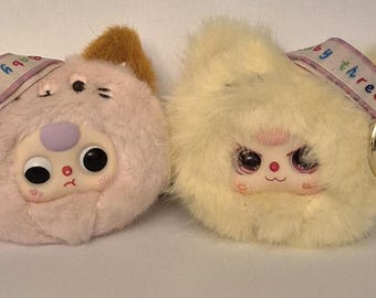 Baby Three Petit Cat Wardrobe plush keychain charm.