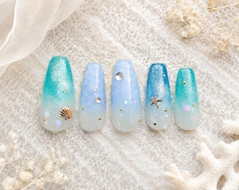 Uñas postizas con diseño oceánico / Uñas playeras / Uñas de gelatina veraniegas / Uñas de gel azul transparente