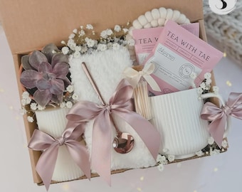 Cozy hygge-inspired gift box featuring a soft blanket for warmth and comfort