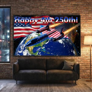 May include: A framed canvas print featuring a patriotic design. The artwork depicts the Earth with American flags and jets, with the text "Happy 4th 250th!" in red, white, and blue. The print is displayed above a dark gray sofa.