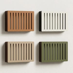 May include: Four rectangular wall-mounted vent covers arranged in a grid. Each cover features a series of vertical slats and comes in a different solid color: terracotta orange, off-white, light beige, and muted olive green with dark sides.