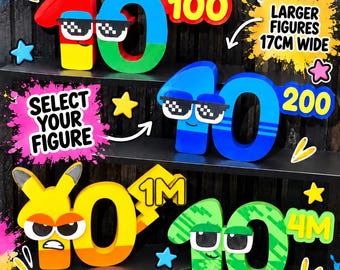 May include: A collection of 3D printed number figures featuring colourful designs, pixelated sunglasses, and expressive faces. The figures are labelled with various numerical values and include text such as WONDERLAND, 3D PRINTED, and LARGER FIGURES 17CM WIDE.