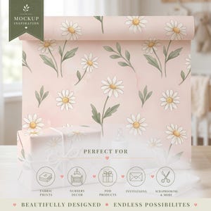 May include: A roll of wrapping paper and a gift box featuring a repeating pattern of white daisies with yellow centers and green leaves on a light pink background. The gift box is tied with a white ribbon and includes text and icons.