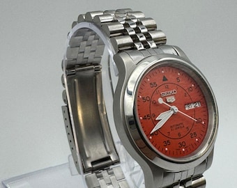 Reloj Seiko 5 vintage con esfera naranja quemada, fabricado en Japón, movimiento original 7s26.