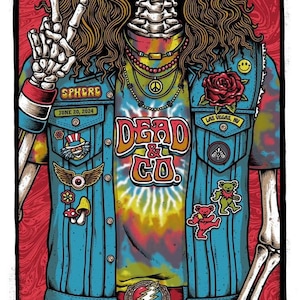 May include: A skeleton wearing a blue denim jacket with patches and a tie-dye shirt. The jacket has patches with a peace sign, a rose, a playing card, and a bear. The shirt says "Dead & Co.". The skeleton is holding up two fingers in a peace sign. The text "Sphere June 20, 2024 Las Vegas, NV" is on the image.