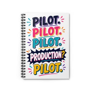 May include: A white spiral-bound notebook with the word "PILOT" in multiple colours. The text "PRODUCTION?" is also included, with a final "PILOT" at the bottom. The design has a playful, colourful aesthetic.