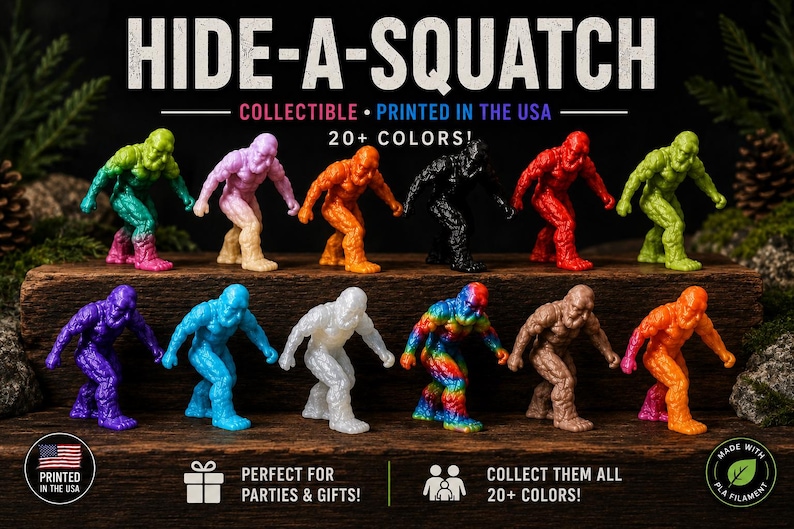 May include: A collection of twelve small, textured Bigfoot figurines in various solid and multi-colored plastic finishes, including green, pink, orange, black, red, purple, blue, white, brown, and a rainbow pattern, arranged on a dark wooden surface.