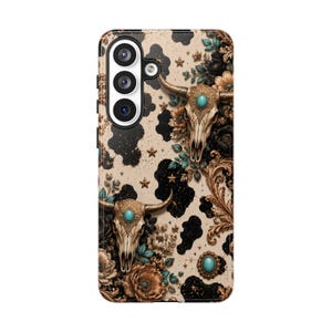 a phone case with a floral and skull design.