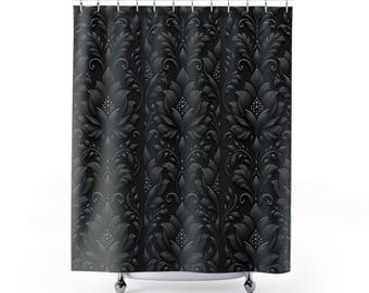 May include: A black shower curtain featuring a repeating damask pattern with embossed-style floral and leaf motifs. The design includes intricate scrollwork and small dot details, creating a textured appearance across the fabric surface.