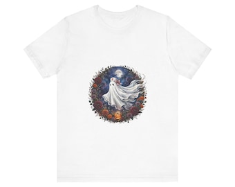 May include: A white short-sleeved t-shirt featuring a circular graphic on the chest. The design depicts a white ghost wearing a nurse cap, surrounded by a dark floral wreath with deep red flowers, autumn leaves, and a glowing jack-o'-lantern.