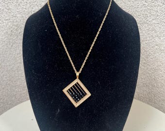 Vintage Swarovski Swan chain necklace gold tones with abacus pendant