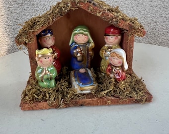 Vintage small ceramic nativity set in wood stable size 5.5” x 4.5” x 2.5”