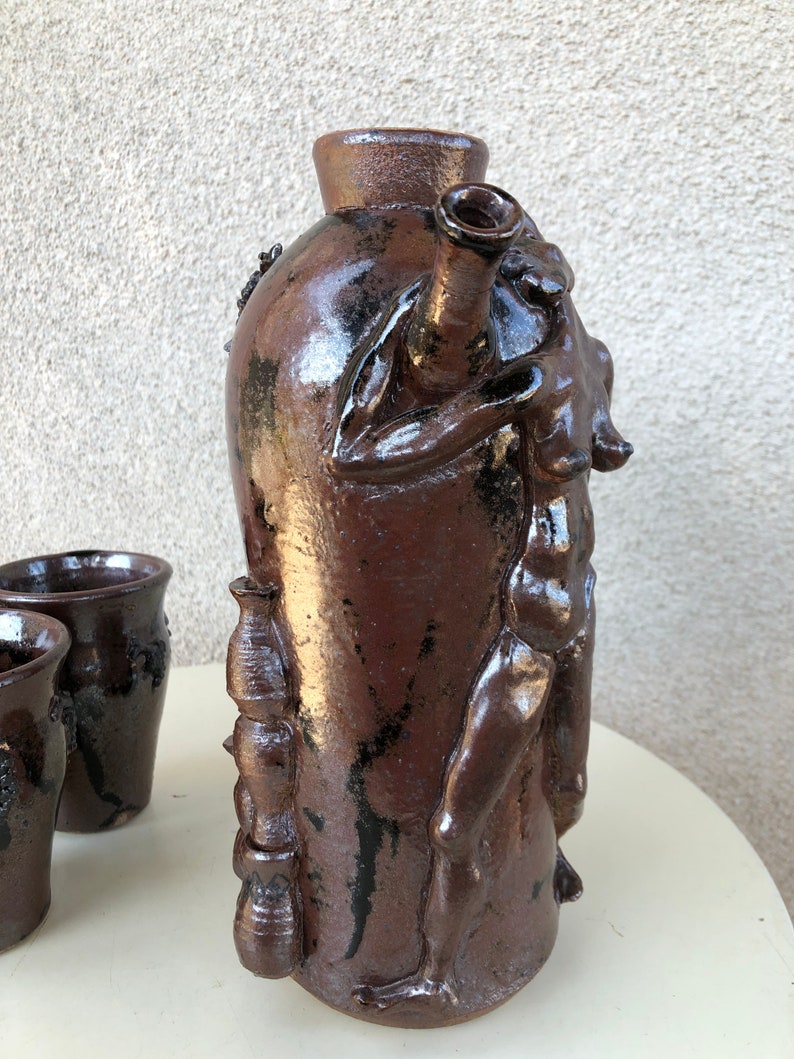 Vintage funky art pottery wine decanter pitcher with 3 cups tribal nude theme brown pottery signed M Hess 1981 image 6