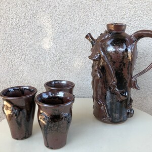 Vintage funky art pottery wine decanter pitcher with 3 cups tribal nude theme brown pottery signed M Hess 1981 image 9
