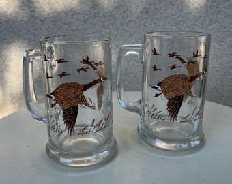 Vintage clear glass beer steins mugs set 2 geese theme holds 12 ozs