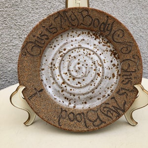 Vintage studio arts stoneware pottery plate 7” religious “This is my Body this is my Blood “ Bible versus etched Stamped wit Cross