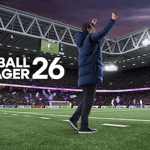 May include: A football stadium scene with the text "FOOTBALL MANAGER 26". A person in a blue jacket celebrates on the pitch. The stands are packed with fans. A football is seen on the side.