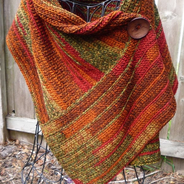 Szydełkowana chusta zapinana na guziki w jesiennych kolorach