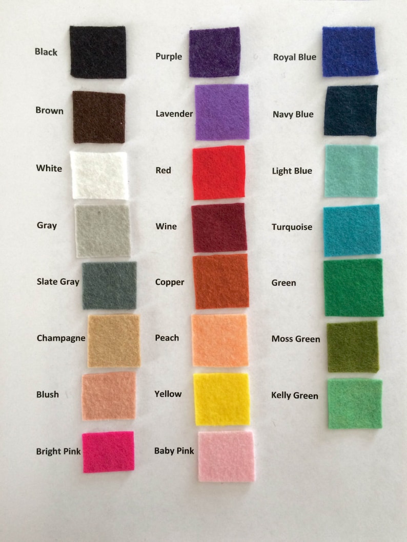 May include: A color chart featuring small, square felt swatches in various colors. The chart includes colors like black, brown, white, gray, red, and green, with each color labeled. The image is well-lit, showcasing the texture and hue of each felt square.