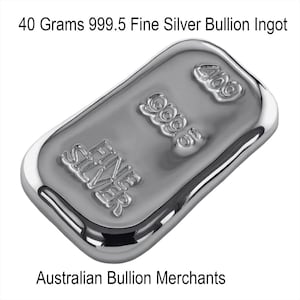 May include: A polished silver bullion ingot, stamped with "FINE SILVER" and "999.5". The text "40 Grams 999.5 Fine Silver Bullion Ingot" is above the ingot. The ingot weighs 40 grams.