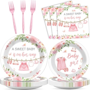 May include: A party supply set featuring pink plastic forks, napkins, and plates decorated with floral patterns and the text A SWEET BABY is on her way and Baby girl. The items display illustrations of baby clothes, shoes, and accessories.