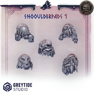 Può includere: Cinque spalline grigie con disegni intricati, tra cui teschi e caratteristiche simili a creature. Il testo "SHOOULDERPADS 1" è visibile in alto. Il logo Greytide Studio è in basso.